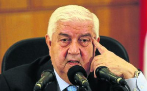 DIGGING IN Syria s Foreign Minister Walid al Muallem speaks during