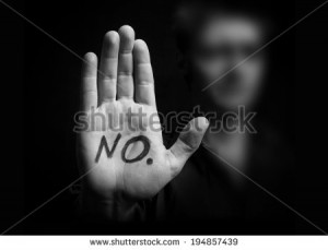 Protest concept.Close-up of palm with male silhouette on black ...