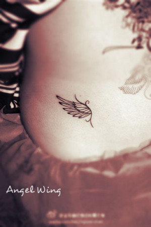 very concise and elegant angel wing tattoo