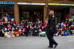 qualitystockphotos-image_of_a_police_officer_on_road_while_people ...