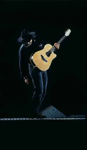 Garth Brooks inducts Carrie Underwood into the Grand Ole Opry on May ...