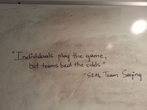 Individuals play the game, but teams beat the odds.