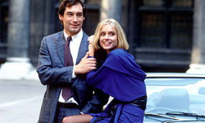 Timothy Dalton and Maryam D'Abo with the Aston Martin V8 (Image ...