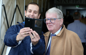 John Motson A member of the crowd has a selfie with Football