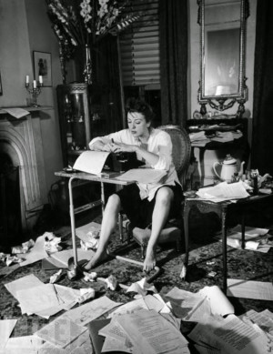 Gypsy Rose Lee writing her book, The G-String Murders (1941)