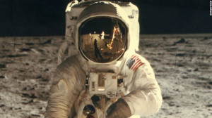 Astronaut Neil Armstrong is seen in the reflection of Edwin 'Buzz ...