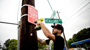 taking quotes from popular rap songs artist creates street signs and ...