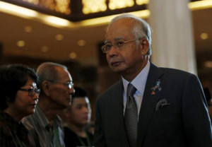 Malaysia's Prime Minister Najib Razak greets family members of victims ...