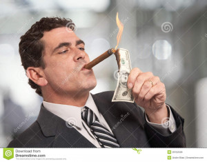 Rich businessman lighting cigar with $100 dollar bill.