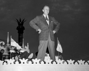 Walt Disney standing on the Mark Twain in Disneyland park in July 1955 ...