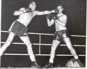 Lethal left hand: Sir Henry Cooper lands one on the money during his ...