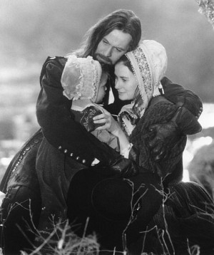 Hester Prynne (Demi Moore), Reverend Dimmesdale (Gary Oldman) and ...