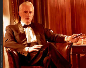 John Slattery as Roger Sterling cigar suit Mad Men Season 6