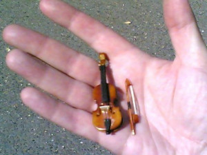Here, the worlds smallest violin is playing for you.