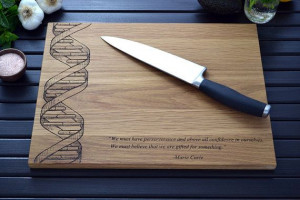 Cutting board engraved with a DNA design and a quote from Marie Curie ...