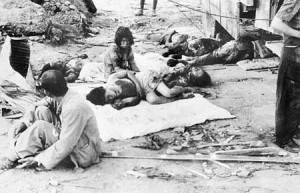 Civilian casualties on a footpath in an Hiroshima street awaiting ...