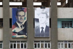 al-Assad and his father, the late former president Hafez al-Assad ...