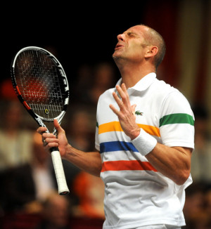 Guy Forget Guy Forget of France reacts after hitting a shot wide
