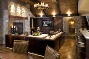 Natural stone, rustic style in this basement family room. Reclaimed ...