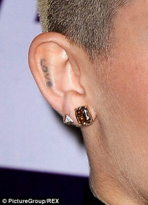 Collection: Miley's tattoo collection features a dream catcher on her ...