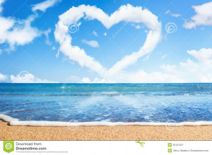 Royalty Free Stock Photography: Beach and sea. Heart of clouds on sky