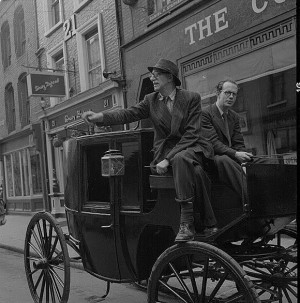Patrick Kavanagh and Anthony Cronin seated on horse and carriage