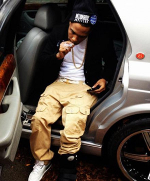 Curren$y hops out wearing the original Air Jordan 3 