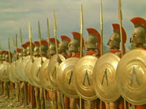 Left: Spartan hoplites in formation. Spartans marked their shields ...
