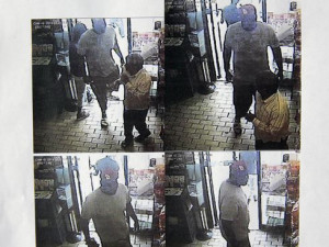 Security camera footage from a convenience store in Ferguson, Mo., on ...