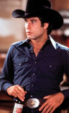 URBAN COWBOY(1980) John Travolta potrays a country boy who goes to the ...