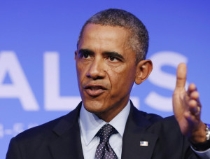Image: U.S. President Barack Obama answers a question at a press ...