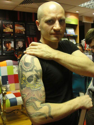 China Mieville's tattoos echo his books.