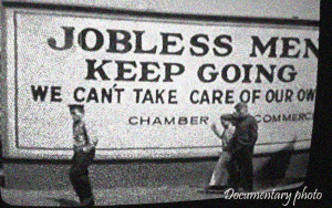 Jobless men keep going Chamber of Commerce billboard...