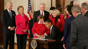 President Obama signing the Lilly Ledbetter Act in 2009.