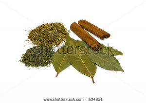 Dried Herbs Oregano Basil Bay Leaves And Cinnamon Sticks Stock Photo