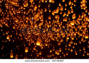Floating Lanterns during Firework Festival in Thailand - stock photo