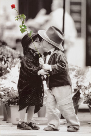 kiss makes the heart young again and wipes out the years .