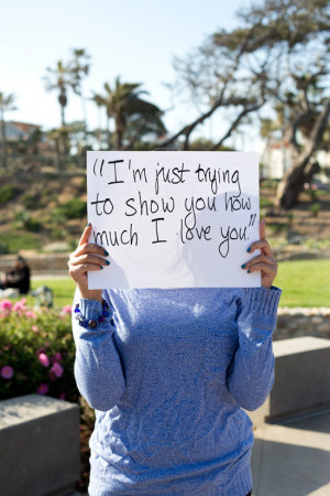 ... assault survivors holding posters with quotes from their attackers (10