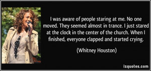 was aware of people staring at me. No one moved. They seemed almost ...