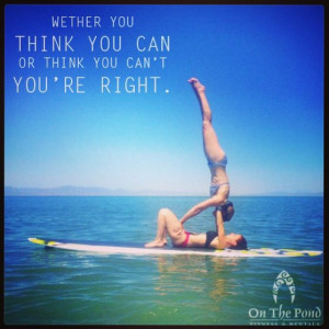 Acro yoga hand stand on a stand up paddle board!