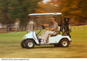 golfer driving golf cart CB054672 Golf Cart Driving