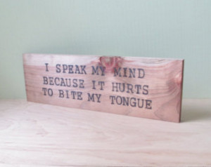 ... my mind because it hurts to bite my tongue - Wood Sign Burned Quote