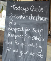 small chalkboard with a quote about the three r's