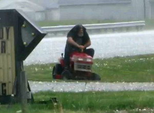 Funny Video Guy Mowing Grass During Hail Storm