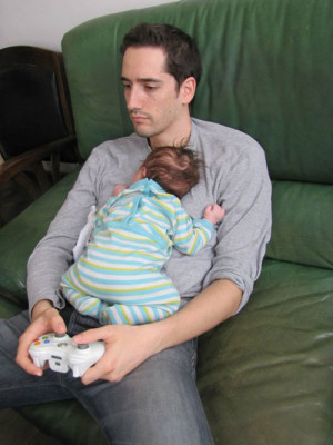 Funny photos funny baby dad playing video games