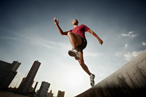 ... running in Havana, Cuba. Horizontal shape, full length, low angle view