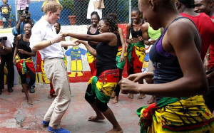 Prince Harry dances with Dormer at a youth community centre during his ...