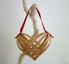 Sweet little DIY woven heart ornament. Slip a little note inside and ...