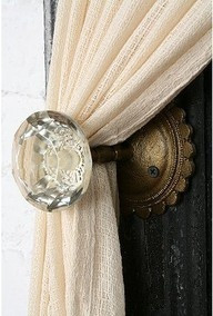 Doorknobs for curtain pulls.