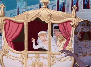 Cinderella and Prince Charming waving from their carriage